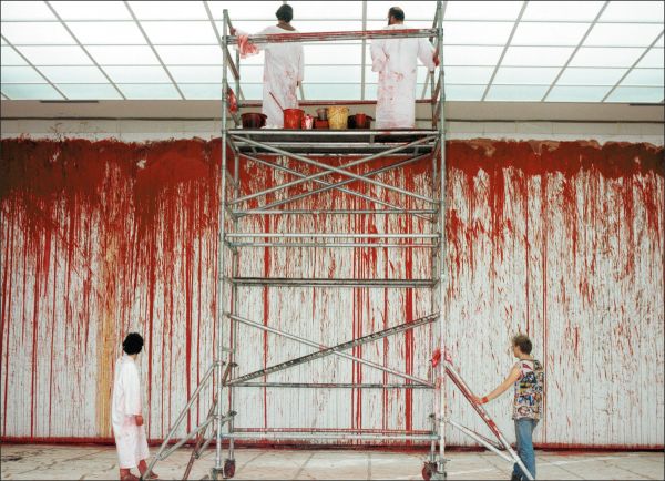 Book cover of Hermann Nitsch, featuring the artist's red paint splattered canvas. Published by Silvana.