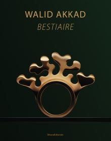 Book cover of Walid Akkad, Bestiaire, with close-up of gold elk ring, bearing four antlers. Published by Silvana.