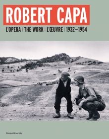 Book cover of Robert Capa, featuring a photo of a Sicilian man telling an American officer which way the Germans had gone, near Troina, Sicily, 1943. Published by Silvana.