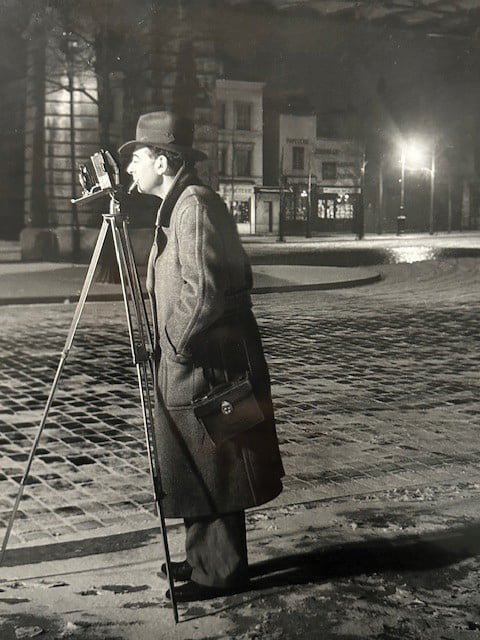 Book cover of Brassaï: The Eye of Paris, with a laughing couple sitting in a bar drinking wine. Published by Silvana.