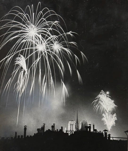 Book cover of Brassaï: The Eye of Paris, with a laughing couple sitting in a bar drinking wine. Published by Silvana.