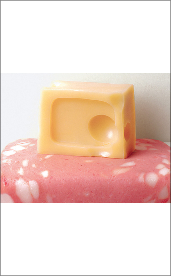 Book cover of Armando Testa, with a red sphere and half of one below. Published by Silvana.