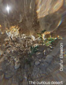 Book cover of Olafur Eliasson: The Curious Desert, with the desert floor seen through an optical device. Published by Silvana.