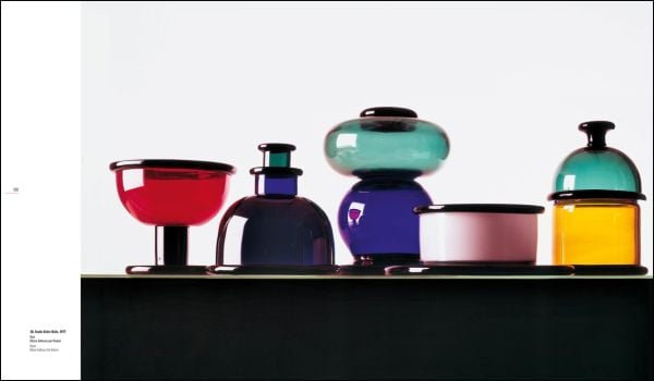 Book cover of Ballo&Ballo: Photography and design in Milan 1956-2005, with a padded chair in the shape of a baseball glove, and a Dalmatian dog lying on it. Published by Silvana.