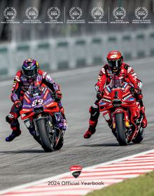 Book cover of Ducati Corse: 2024 Official Yearbook, with rider Jorge Martin racing alongside Francesco Bagnaia. Published by Silvana.