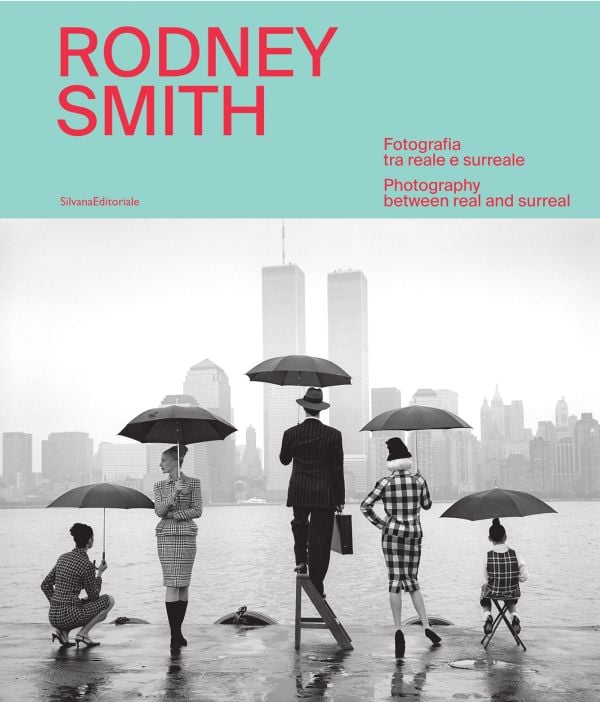 Book cover of Rodney Smith: Photography Between Real and Surreal; featuring five figures holding umbrellas, looking out across the water at New York skyline, with their backs to the viewer. Published by Silvana.
