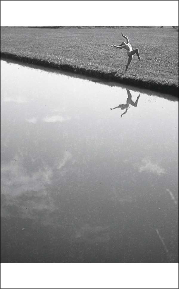 Book cover of Lartigue | Kertész, featuring two black and white photographs by the sea. Published by Silvana.