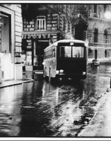 Book cover of Federico Garolla: Fotografie/Photographs 1948-1968, with a photograph of white sheets hanging in the street. Published by Silvana.