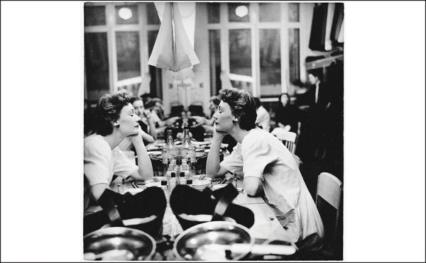 Book cover of Federico Garolla: Fotografie/Photographs 1948-1968, with a photograph of white sheets hanging in the street. Published by Silvana.