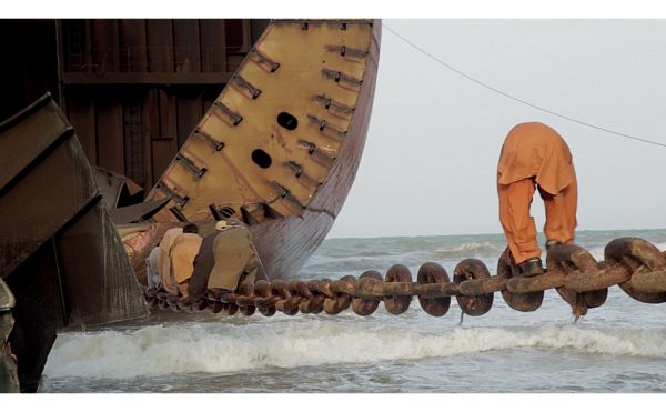 Book cover of Manzar: Art and Architecture from Pakistan 1940s to Today, featuring a painting of figure in red robes and turban-style head dress. Published by Silvana.