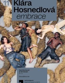 Book cover of Klára Hosnedlová: embrace; featuring a large installation with figures laying on floor surrounded by material sculptures. Published by Silvana.
