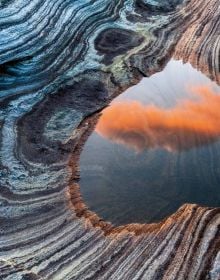 Book cover of Masterpieces of the Earth, From Fire to Ice, the Creation of Our World', with The Wave: sandstone rock formation in Arizona. Published by White Star.
