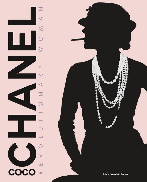 Book cover of Coco Chanel, Revolutionary Woman, with a black silhouette of female smoking, with white pearls around neck. Published by White Star.