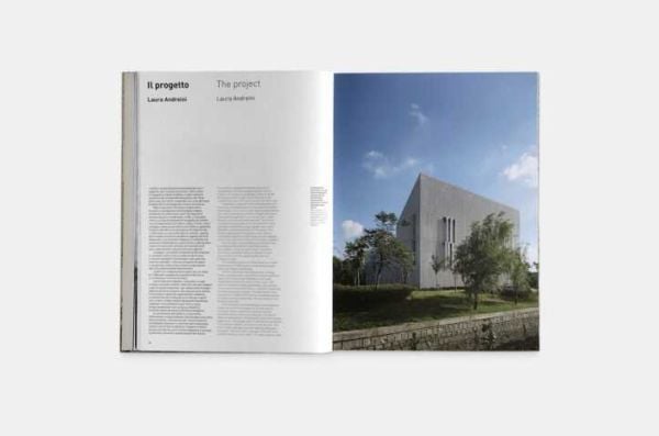 Modern architectural building with patterned surface and green trees below, on cover of 'Green Energy Laboratory, Archea Associati', by Forma Edizioni.