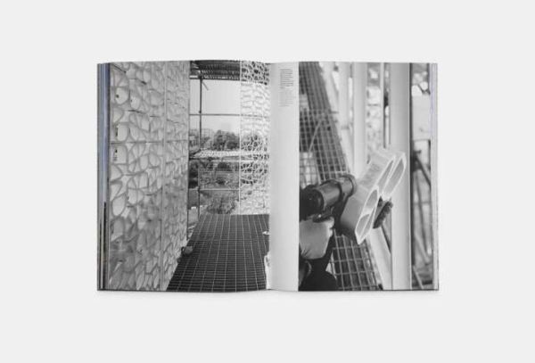 Modern architectural building with patterned surface and green trees below, on cover of 'Green Energy Laboratory, Archea Associati', by Forma Edizioni.