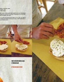 Italian sandwich with cheese and salami, on grease paper, the PAN'INO in stencilled cream font above