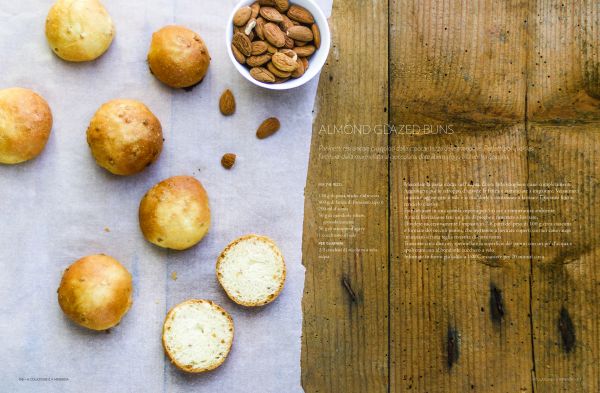 Book cover of Sourdough, A Complete Guide and Recipe Book, featuring a large round sourdough bread, dusted with flour, on wood board. Published by Guido Tommasi Editore.