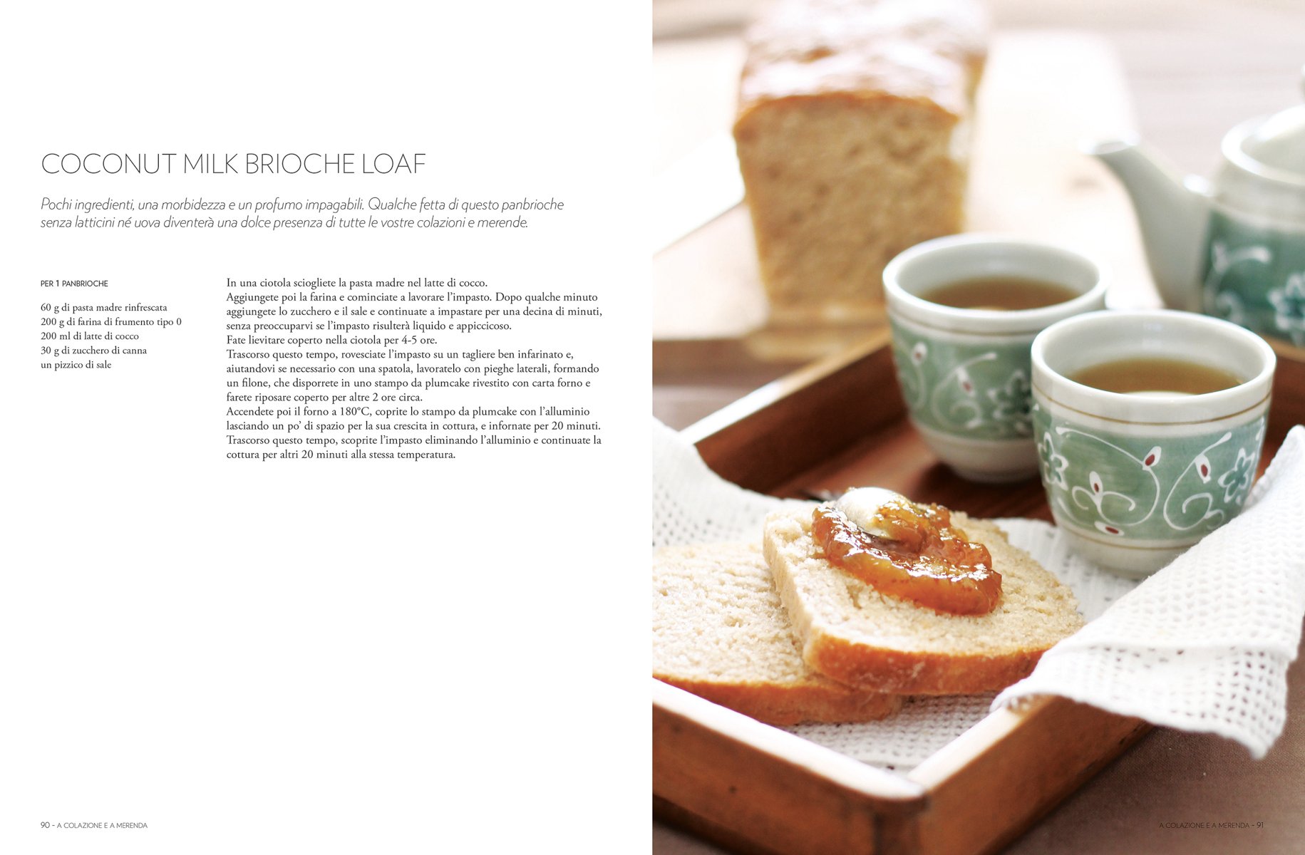 Large round brown top sourdough bread, dusted with flour, on wood board, on cover of 'Sourdough, A Complete Guide and Recipe Book', by Guido Tommasi Editore.