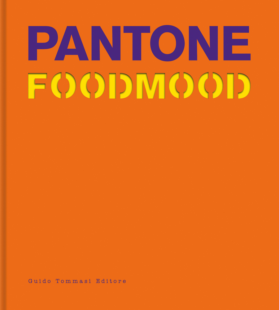 Purple and yellow font to top of orange cover of 'Pantone Foodmood', by Guido Tommasi Editore.