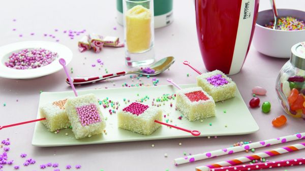 Purple and yellow font to top of orange cover of 'Pantone Foodmood', by Guido Tommasi Editore.