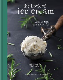 Scoop of white ice cream, with sprigs of rosemary, on cover of 'The Book of Ice Cream', by Guido Tommasi Editore.