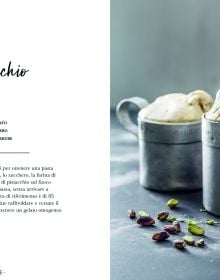 Scoop of white ice cream, with sprigs of rosemary, on cover of 'The Book of Ice Cream', by Guido Tommasi Editore.