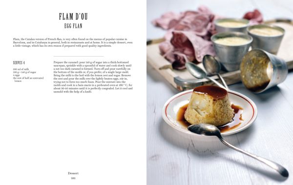 Book cover of The Boqueria, with Barcelona's La Boqueria food market, with large lights hanging from ceiling above crowds of shoppers and tourists. Published by Guido Tommasi Editore.
