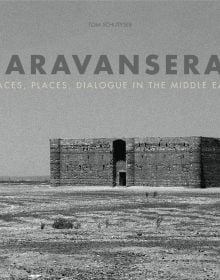 Landscape book cover of Caravanserai, Traces, Places, Dialogue in the Middle East, featuring a black and white photo of large, flat-roofed building in Middle Eastern landscape. Published by 5 Continents Editions.