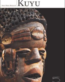 Black book cover of Kuyu, featuring a carved wooden head. Published by 5 Continents Editions.