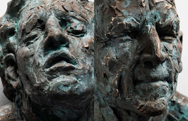 White book cover of Matteo Pugliese, featuring a sculpture of head with closed eyes and a screaming open mouth and flexed hands. Published by 5 Continents Editions.