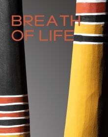 Book cover of Breath of Life, with two Yidaki instruments in black and yellow with white painted rings. Published by 5 Continents Editions.