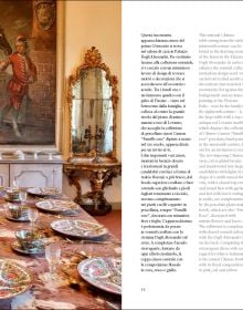 Book cover of Dining in Style: Between the Traditional and the Contemporary, featuring a classical dining table with crystal glasses and floral, porcelain plates. Published by Mandragora.