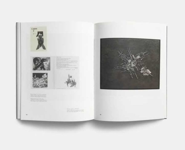 Metal sculpture, The Moon, the Sun, the Tower by Arnaldo Pomodoro, on brown cover of 'Arnaldo Pomodoro 1956-65', by Forma Edizioni.