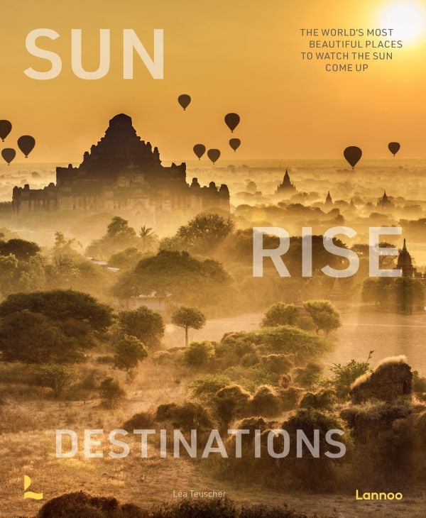 Book cover of Sunrise Destinations; featuring a sunset landscape with hot air balloons rising in the distance. Published by Lannoo Publishers.