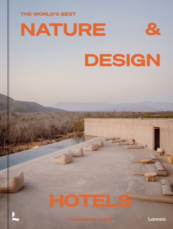 Book cover of The World’s Best Nature & Design Hotels; featuring a modern desert hotel with outdoor loungers. Published by Lannoo Publishers.