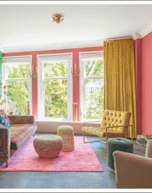 Book cover of Colour Combinations: Tips, tricks & moodboards, featuring a bold, colourful interior with pink chairs and a green ceiling. Published by Lannoo Publishers.