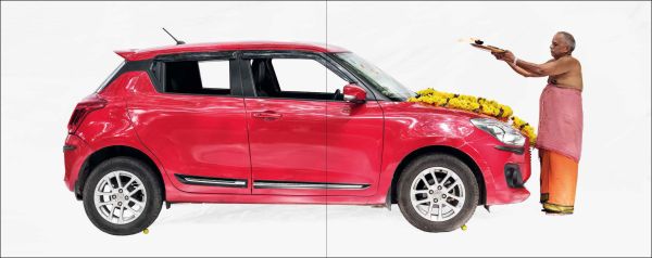 Book cover of Homo Mobilis: People/Vehicles/Identity; featuring a car owner sitting in their pride and joy. Published by Lannoo Publishers.