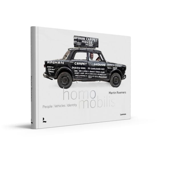 Book cover of Homo Mobilis: People/Vehicles/Identity; featuring a car owner sitting in their pride and joy. Published by Lannoo Publishers.