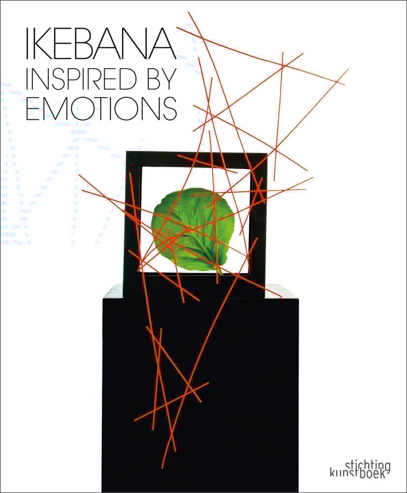 Book cover of Ikebana Inspired by Emotions, featuring a box with a green leaf inside, with an abstract sculpture of red sticks. Published by Stichting.