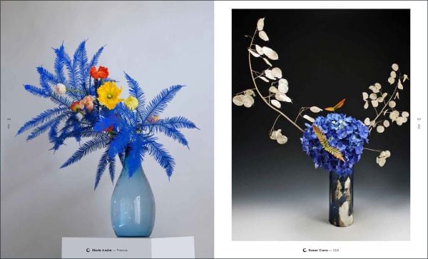 Book cover of Ikebana Inspired by Emotions, featuring a box with a green leaf inside, with an abstract sculpture of red sticks. Published by Stichting.