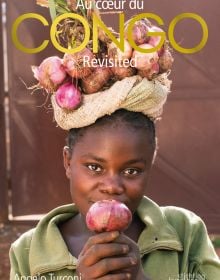Book cover of Congo Revisited, featuring an African girl holding red onion to lips, bunch of onions resting on head. Published by Stichting.