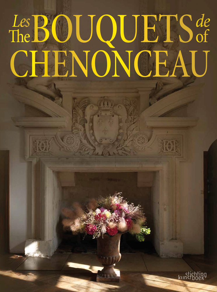 Bouquet of flowers in urn with base, in front of decorative fireplace, THE BOUQUETS OF CHENONCEAU in bright yellow font above.