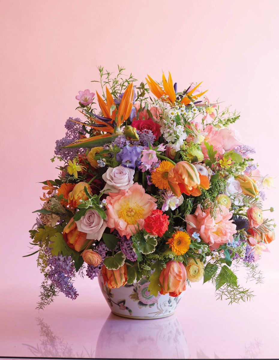 Red and yellow flame lilies, pink cover, Per Benjamin ELEMENTS in white and yellow font on orange transparent central banner.