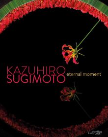 Book cover of Kazuhiro Sugimoto's Eternal Moment, with a beautiful red and yellow flame lily with wavy tepals. Published by Stichting.
