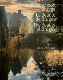 City canal with arched bridge on cover of 'The Beauty of Bruges', by Stichting