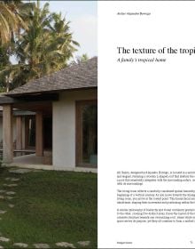 Book cover of Tropical Retreats; featuring an interior living space with wood furniture and bamboo beams. Published by Lannoo Publishers.