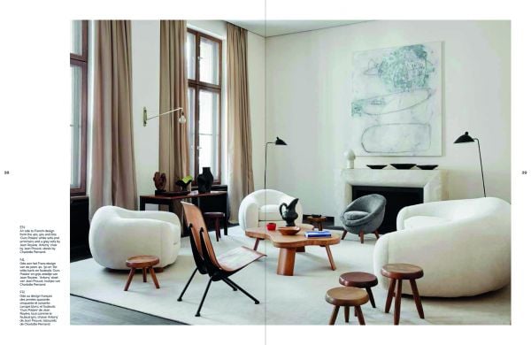 Interior dining space, landscape mural on wall, industrial silver flue in corner, on cover of 'Living in the City, Urban Interiors and Portraits', by Lannoo Publishers.