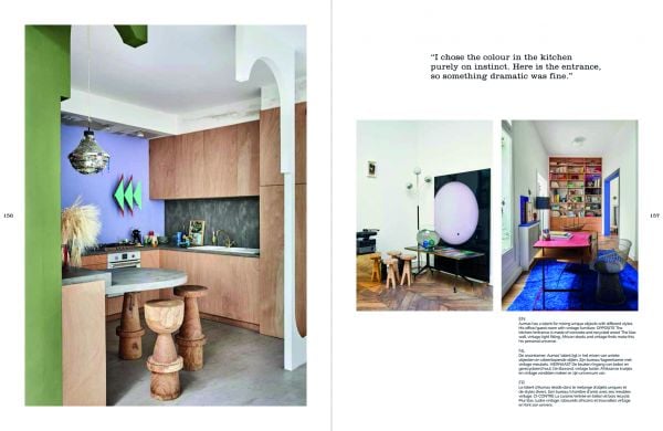 Interior dining space, landscape mural on wall, industrial silver flue in corner, on cover of 'Living in the City, Urban Interiors and Portraits', by Lannoo Publishers.