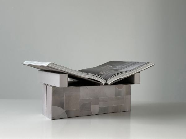 Beige shapes on cover of '40 by Studio Piet Boon', by Lannoo Publishers.