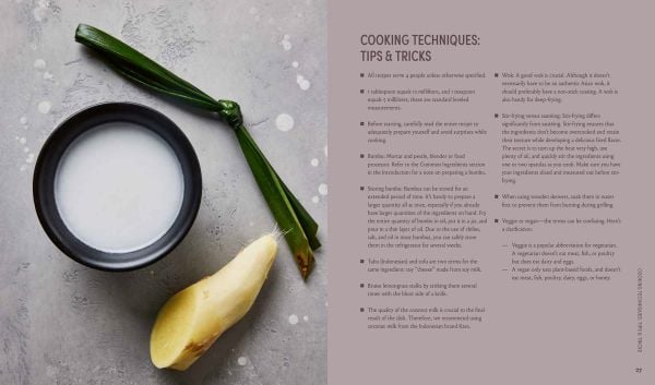 Book cover of Blauw's Veggie Kitchen: Restaurant Blauw's Crew Presents 70 Authentic Vegetarian and Vegan Recipes, with a fork covered in green powder. Published by Lannoo Publishers.